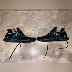Black Nike training shoes